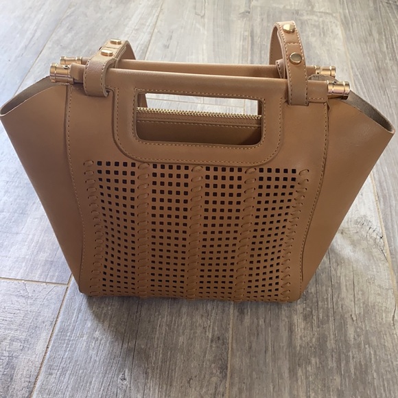 Non brand tan purse with cute detail.  Shows wear inside pocket. - Picture 5 of 5